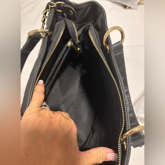 Elegant Black Leather Handbag Adjustable strap, and lightweight